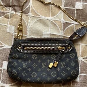 Authentic Louis Vuitton wristlet.